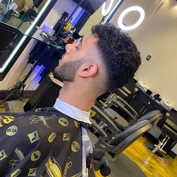 Clean beard line-up and fade